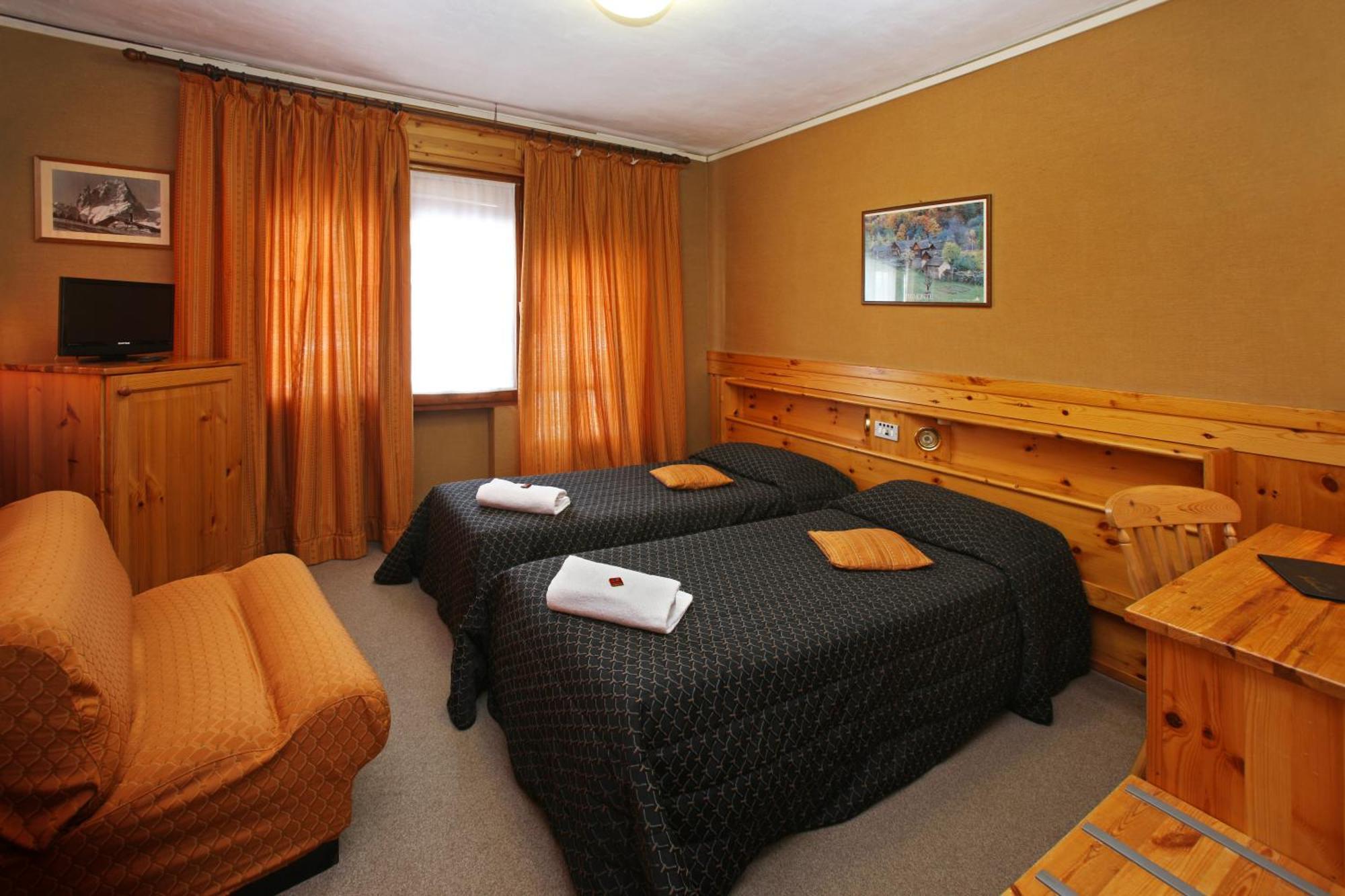 Hotel Splendid Oulx Quarto foto